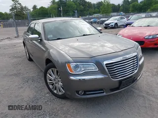 2012 Chrysler 300 Limited with VIN 2C3CCAHG2CH213127, listed as a IAAI auction lot 42330723 with 166,618 mi miles and . Bid and sale history available at DreamBid. Image 1.