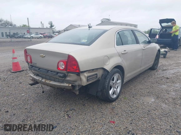 2011 Chevrolet Malibu 1LS with VIN 1G1ZB5E14BF326893, listed as a IAAI auction lot 42175943 with 163,887 mi miles and . Bid and sale history available at DreamBid. Image 4.