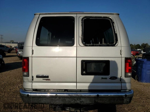 2009 Ford Econoline Passenger XL with VIN 1FMNE11L29DA55878, listed as a Copart auction lot 74945294 with 75,086 mi miles and Salvage title. Bid and sale history available at DreamBid. Image 6.