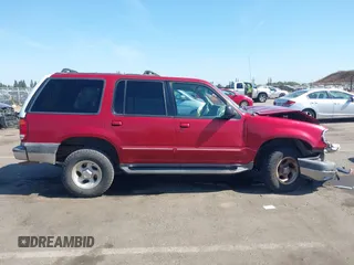 2001 Ford Explorer XLT z VIN 1FMDU73E51ZA06701, wystawiony jako IAAI lot #42379931 z przebiegiem 211 904 mil mil oraz . Historia ofert i sprzedaży dostępna na DreamBid. Obrazek 14.