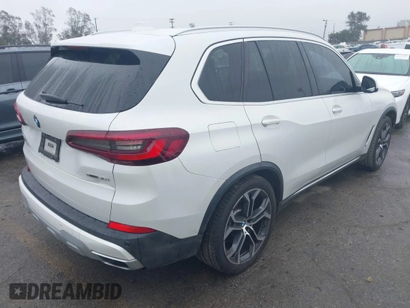 2021 BMW X5 sDrive40i with VIN 5UXCR4C03M9F24817, listed as a IAAI auction lot 41512172 with 54,867 mi miles. Bid and sale history available at carsss.com. Image 4.