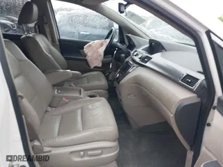 2015 Honda Odyssey Touring Elite with VIN 5FNRL5H98FB076428, listed as a IAAI auction lot 41998339 with 114,573 mi miles. Bid and sale history available at carsss.com. Image 5.