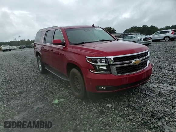 2015 Chevrolet Suburban LT with VIN 1GNSCJKC2FR306223, listed as a Copart auction lot 58733475 with 191,330 mi miles and Salvage title. Bid and sale history available at DreamBid. Image 14.