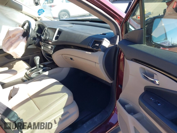 2019 Honda Ridgeline RTL-E with VIN 5FPYK3F72KB024461, listed as a IAAI auction lot 41813568 with 122,364 mi miles and . Bid and sale history available at DreamBid. Image 5.