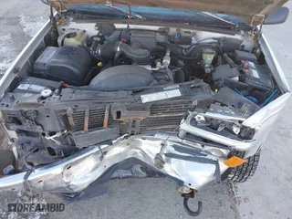 1996 Chevrolet Tahoe with VIN 1GNEK13R3TJ318572, listed as a IAAI auction lot 41419555 with 199,201 mi miles. Bid and sale history available at carsss.com. Image 10.