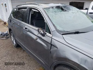 2021 Volkswagen Tiguan SE z VIN 3VV2B7AXXMM070228, wystawiony jako IAAI lot #42295644 z przebiegiem 89 576 mil mil oraz . Historia ofert i sprzedaży dostępna na DreamBid. Obrazek 13.
