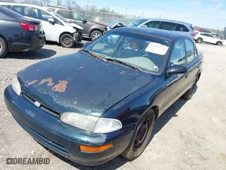 1997 Geo Prizm with VIN 1Y1SK5268VZ462502, listed as a IAAI auction lot 41929276 with 243,149 mi miles. Bid and sale history available at carsss.com. Image 2.