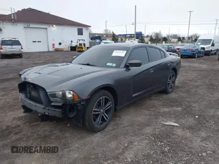 2014 Dodge Charger SXT with VIN 2C3CDXJG6EH372066, listed as a IAAI auction lot 41975705 with 112,672 mi miles. Bid and sale history available at carsss.com. Image 2.