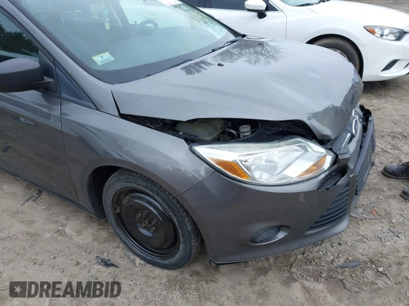 2012 Ford Focus S with VIN 1FAHP3E23CL306547, listed as a IAAI auction lot 41831357 with 187,629 mi miles and . Bid and sale history available at DreamBid. Image 13.