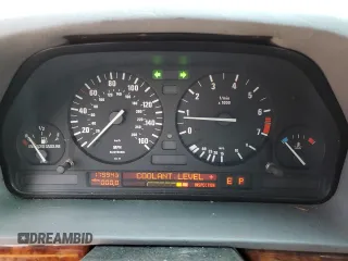 1994 BMW 7 Series z VIN WBAGD4329RDE68127, wystawiony jako Copart lot #70697044 z przebiegiem 179 943 mil mil oraz Czysty tytuł • Clean title. Historia ofert i sprzedaży dostępna na DreamBid. Obrazek 9.