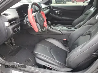 2020 Toyota Supra 3.0 z VIN WZ1DB4C04LW030801, wystawiony jako Copart lot #51373725 z przebiegiem 31 547 mil mil oraz Szkody całkowita. Historia ofert i sprzedaży dostępna na DreamBid. Obrazek 7.