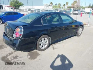 2003 Nissan Altima S with VIN 1N4AL11D93C268136, listed as a IAAI auction lot 41960386 with 181,444 mi miles. Bid and sale history available at carsss.com. Image 4.