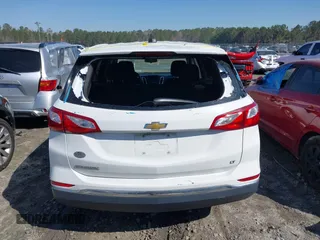 2021 Chevrolet Equinox LT with VIN 3GNAXKEV7MS132050, listed as a IAAI auction lot 41770065 with 116,921 mi miles and . Bid and sale history available at DreamBid. Image 16.