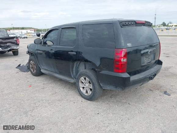 2010 Chevrolet Tahoe LS with VIN 1GNUKAE06AR252687, listed as a IAAI auction lot 41818559 with 158,877 mi miles. Bid and sale history available at carsss.com. Image 3.