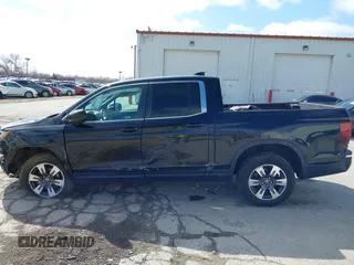 2019 Honda Ridgeline RTL z VIN 5FPYK3F50KB000027, wystawiony jako IAAI lot #41856522 z przebiegiem 98 590 mil mil oraz . Historia ofert i sprzedaży dostępna na DreamBid. Obrazek 15.