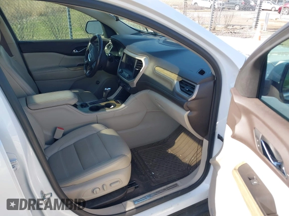 2019 GMC Acadia Denali with VIN 1GKKNXLSXKZ173883, listed as a IAAI auction lot 41863843 with 85,067 mi miles and . Bid and sale history available at carsss.com. Image 5.