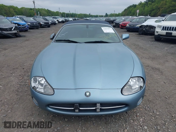 2002 Jaguar XK with VIN SAJDA42CX2NA28816, listed as a IAAI auction lot 42029672 with 130,978 mi miles and . Bid and sale history available at DreamBid. Image 6.
