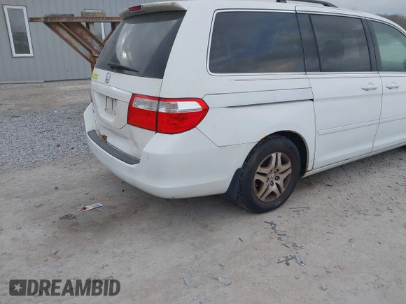 2007 Honda Odyssey EX-L with VIN 5FNRL38607B403903, listed as a IAAI auction lot 42074718 with 148,816 mi miles. Bid and sale history available at carsss.com. Image 4.