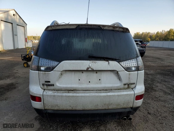 2009 Mitsubishi Outlander XLS with VIN JA4MT41X99Z605598, listed as a Copart auction lot 74113194 with 165,806 mi miles and Clean Title. Bid and sale history available at carsss.com. Image 6.
