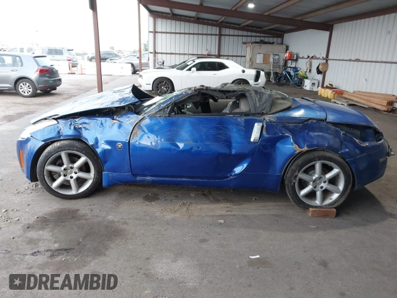 2005 Nissan 350Z Touring with VIN JN1AZ36A45M753058, listed as a IAAI auction lot 41563023 with 1 mi miles. Bid and sale history available at carsss.com. Image 14.