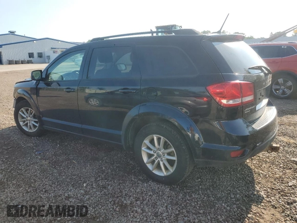 2017 Dodge Journey SXT with VIN 3C4PDDBG8HT525147, listed as a Copart auction lot 63270795 with 169,369 mi miles and Salvage title. Bid and sale history available at DreamBid. Image 2.