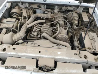 1996 Ford Ranger XL z VIN 1FTCR14A0TPA74350, wystawiony jako Copart lot #53103215 z przebiegiem 174 483 mil mil oraz Czysty tytuł • Clean title. Historia ofert i sprzedaży dostępna na DreamBid. Obrazek 11.