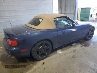 2001 Mazda MX-5 Miata with VIN JM1NB353510209224, listed as a Copart auction lot 51736955 with 103,732 mi miles and Salvage Title. Bid and sale history available at DreamBid. Image 3.