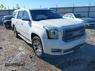 2016 GMC Yukon XL SLT with VIN 1GKS2GKC0GR268527, listed as a IAAI auction lot 40776614 with 140,566 mi miles. Bid and sale history available at carsss.com. Image 1.