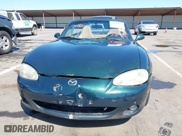 2001 Mazda MX-5 Miata with VIN JM1NB353410203981, listed as a IAAI auction lot 42028077 with Not Provided miles and . Bid and sale history available at DreamBid. Image 6.