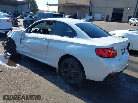 2016 BMW 2 Series M235i with VIN WBA1J7C5XGV359562, listed as a IAAI auction lot 39990299 with 54,022 mi miles. Bid and sale history available at carsss.com. Image 3.