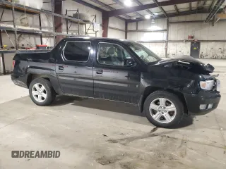 2010 Honda Ridgeline RTL with VIN 5FPYK1F5XAB011944, listed as a Copart auction lot 52434175 with 137,585 mi miles and Salvage title. Bid and sale history available at DreamBid. Image 4.