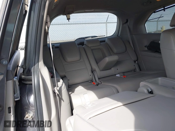 2014 Honda Odyssey Touring with VIN 5FNRL5H91EB093540, listed as a IAAI auction lot 41887412 with 202,076 mi miles and . Bid and sale history available at DreamBid. Image 20.