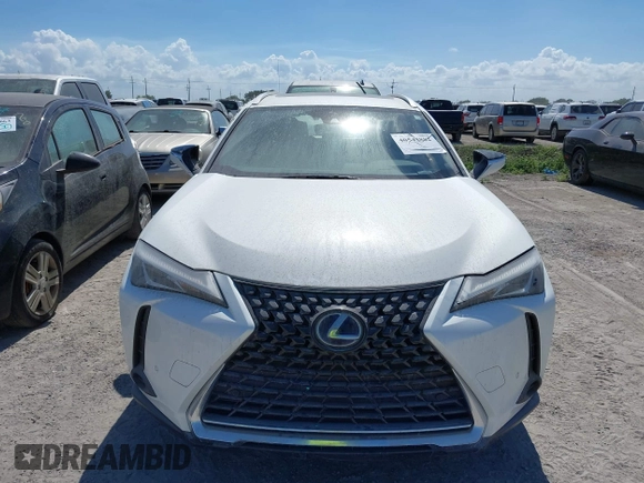 2021 Lexus UX with VIN JTHP9JBH4M2044900, listed as a IAAI auction lot 40543882 with 1 mi miles. Bid and sale history available at carsss.com. Image 6.