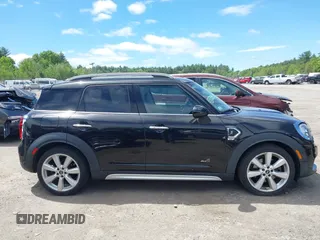 2017 MINI Countryman Cooper S z VIN WMZYT5C39H3D79798, wystawiony jako IAAI lot #42274782 z przebiegiem 96 669 mil mil oraz . Historia ofert i sprzedaży dostępna na DreamBid. Obrazek 14.