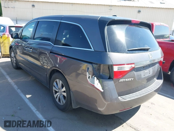 2012 Honda Odyssey EX-L with VIN 5FNRL5H65CB012428, listed as a IAAI auction lot 42164272 with 256,253 mi miles and . Bid and sale history available at carsss.com. Image 3.