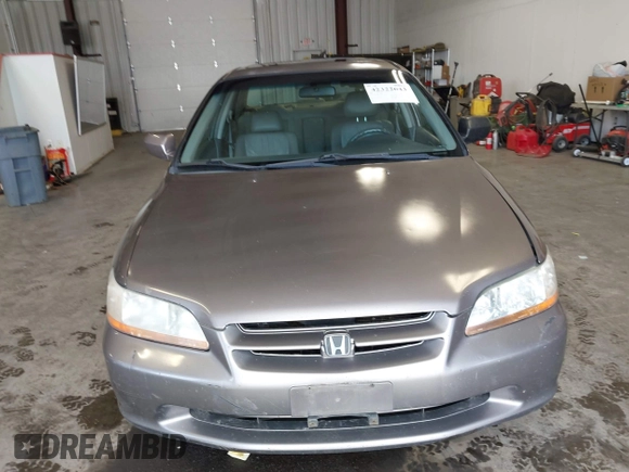 2000 Honda Accord EX z VIN 1HGCG1657YA053433, wystawiony jako IAAI lot #42322643 z przebiegiem 146 517 mil mil oraz . Historia ofert i sprzedaży dostępna na DreamBid. Obrazek 12.
