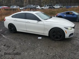 2019 BMW 4 Series 430i xDrive with VIN WBA4J3C55KBL04971, listed as a Copart auction lot 52088445 with 112,353 mi miles and Clean Title. Bid and sale history available at carsss.com. Image 4.