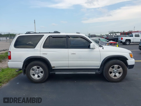 1998 Toyota 4Runner SR5 z VIN JT3GN86R5W0060650, wystawiony jako IAAI lot #42373192 z przebiegiem 264 886 mil mil oraz . Historia ofert i sprzedaży dostępna na DreamBid. Obrazek 14.