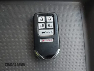 2016 Honda Odyssey EX-L with VIN 5FNRL5H61GB128957, listed as a IAAI auction lot 41953181 with 136,386 mi miles and . Bid and sale history available at DreamBid. Image 11.