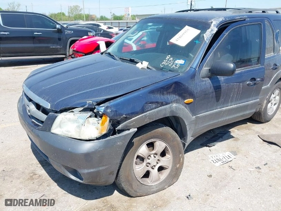2003 Mazda Tribute LX with VIN 4F2CZ04133KM23234, listed as a IAAI auction lot 41869955 with 240,898 mi miles. Bid and sale history available at carsss.com. Image 6.