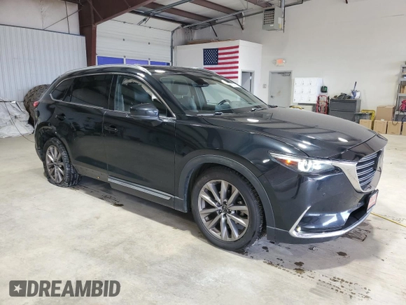 2021 Mazda CX-9 Carbon Edition with VIN JM3TCBDY7M0516272, listed as a Copart auction lot 62078735 with 81,424 mi miles and Salvage title. Bid and sale history available at DreamBid. Image 4.