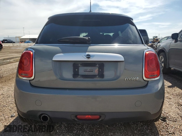 2015 MINI Hardtop with VIN WMWXM5C5XFT974077, listed as a Copart auction lot 58063965 with 93,853 mi miles and Salvage title. Bid and sale history available at DreamBid. Image 6.