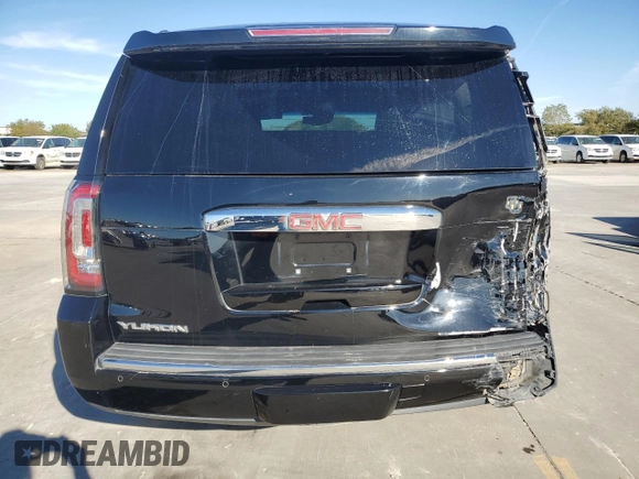 2019 GMC Yukon Denali with VIN 1GKS2CKJ9KR186604, listed as a Copart auction lot 82201124 with 110,069 mi miles and Salvage Title. Bid and sale history available at DreamBid. Image 6.