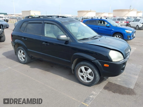 2006 Hyundai Tucson GL with VIN KM8JM12B26U340745, listed as a IAAI auction lot 42129680 with 87,133 mi miles. Bid and sale history available at carsss.com. Image 1.