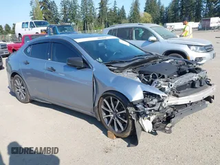 2015 Acura TLX V6 with VIN 19UUB2F32FA025334, listed as a IAAI auction lot 42099075 with 107,409 mi miles. Bid and sale history available at carsss.com. Image 1.