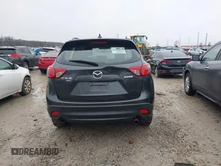 2016 Mazda CX-5 Sport with VIN JM3KE4BY5G0885754, listed as a IAAI auction lot 41103575 with 136,263 mi miles and . Bid and sale history available at carsss.com. Image 17.