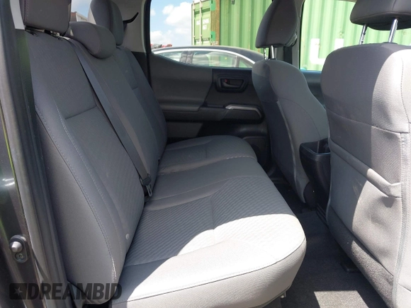 2021 Toyota Tacoma SR z VIN 3TMCZ5AN2MM392590, wystawiony jako IAAI lot #42178072 z przebiegiem 42 542 mil mil oraz . Historia ofert i sprzedaży dostępna na DreamBid. Obrazek 8.