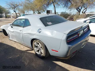 2021 Dodge Challenger SXT with VIN 2C3CDZAG5MH534621, listed as a IAAI auction lot 41667234 with 78,947 mi miles. Bid and sale history available at carsss.com. Image 3.