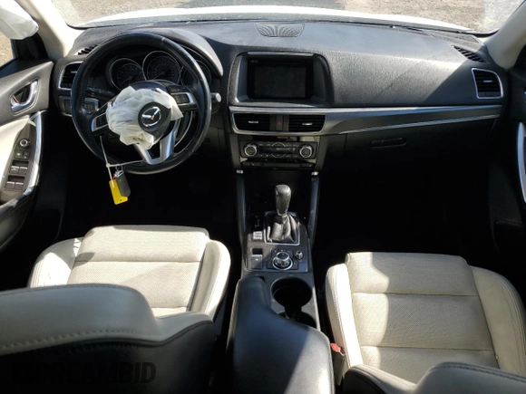 2016 Mazda CX-5 Grand Touring with VIN JM3KE4DYXG0781063, listed as a Copart auction lot 47099825 with 0 mi miles and Salvage Title. Bid and sale history available at carsss.com. Image 8.