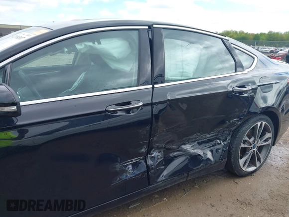 2019 Ford Fusion Titanium with VIN 3FA6P0K92KR248521, listed as a IAAI auction lot 42198307 with 51,844 mi miles and . Bid and sale history available at DreamBid. Image 6.